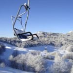 Seggiovia innevata sul Monte Caio, Schia