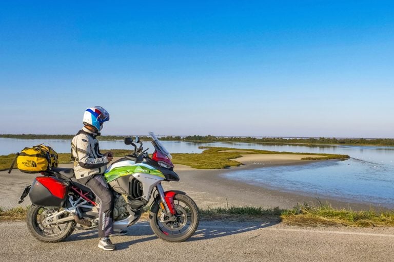 Motorcycle trip through Po Delta Park between Art and Nature