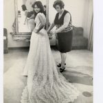 Atelier Clara Centinaro. Clara Centinaro tries on a wedding dress, undated. Photographic black and white print on silver bromide paper; Interphoto Azienda Italiana per la stampa e Rastelli mm. 300 X226 D042299S