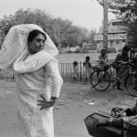 Dayanita Singh (New Delhi, India, 1961) To bless the newborn child, I am dancing in front of the house, 1994, Dal portfolio Myself Mona Ahmed, 1989–2000, 21 Stampe gelatine ai sali d’argento 30,5 x 45,5 cm ciascuna. Collezione Fondazione di Modena – FMAV ©Dayanita Singh, in Logos. Le immagini parlano, Palazzo Santa Margherita, Modena